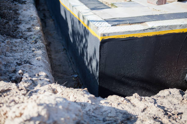 Professional Emergency Waterproofing technician working in Waupaca, WI